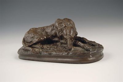 Appraisal: A Deva Recumbent deer hound bronze signed in cm h