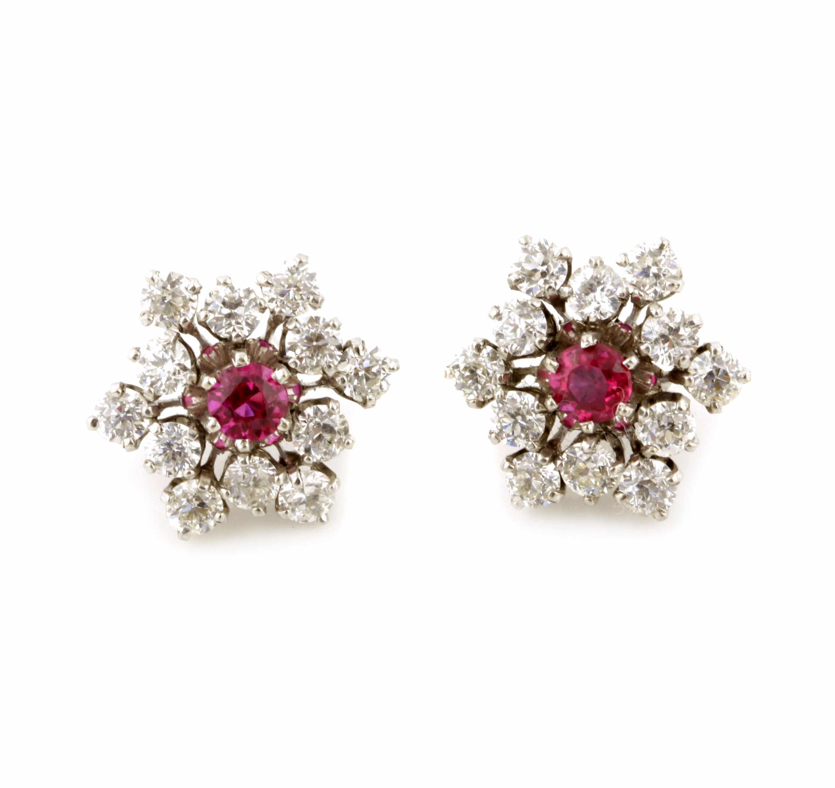 Appraisal: A pair of red stone diamond and white gold star