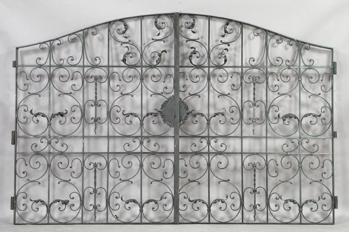 Appraisal: Large Pair of Mediterranean-Style Wrought-Iron Driveway Gates with a foliate