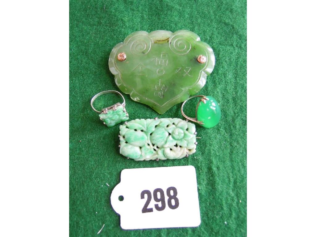 Appraisal: A collection of jade jewellery including an engraved Chinese brooch