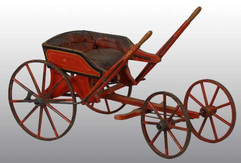 Appraisal: Child's Velocipede Description Foot steering mechanism and handles make cart