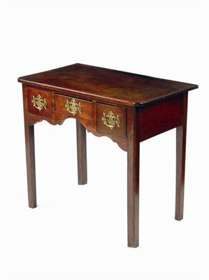 Appraisal: A George III oak side table the moulded edge top