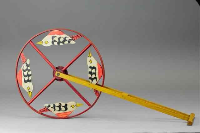 Appraisal: BIRD THEME HOOP TOY Wooden wheel with four hand painted