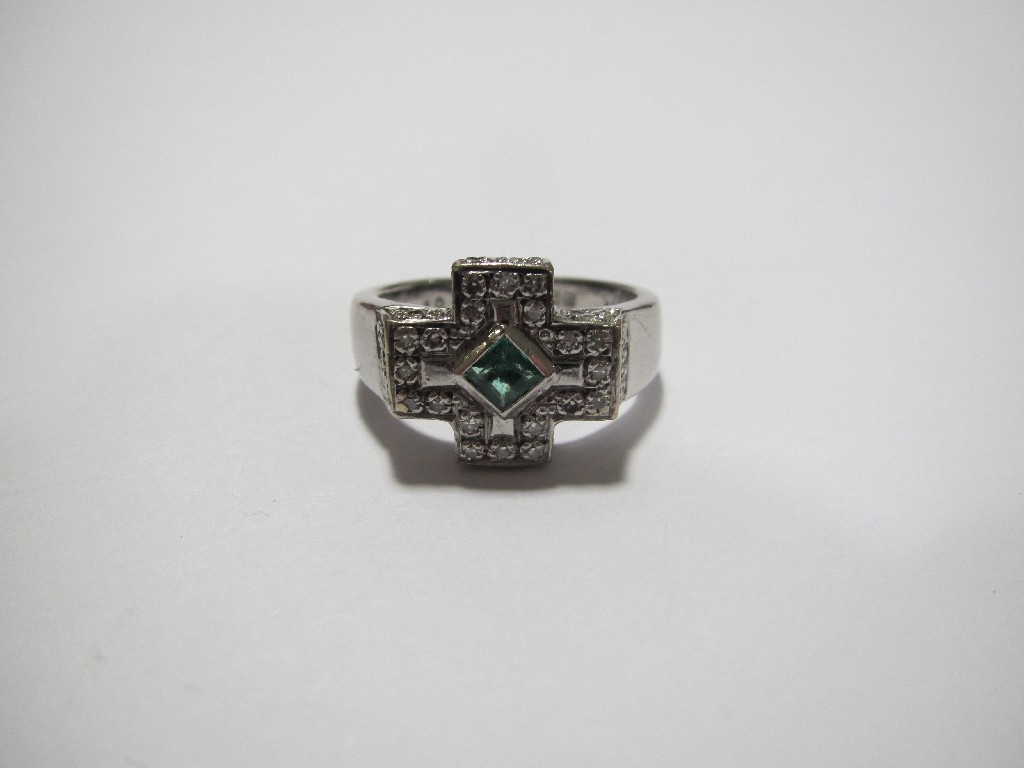 Appraisal: An emerald and diamond cruciform ring the raised emerald centre