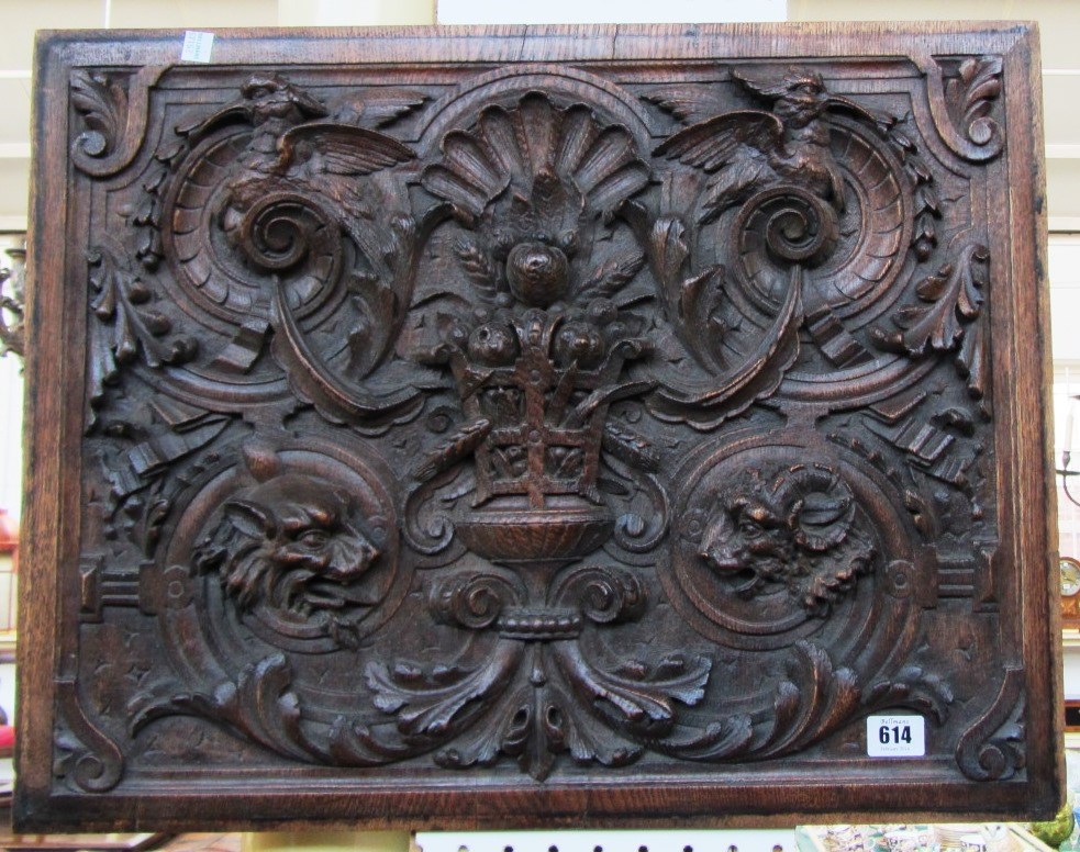 Appraisal: A th century oak panel relief carved with opposing bird