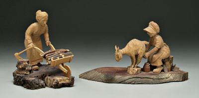 Appraisal: Two Tom Wolfe carvings woman milking goat x x in