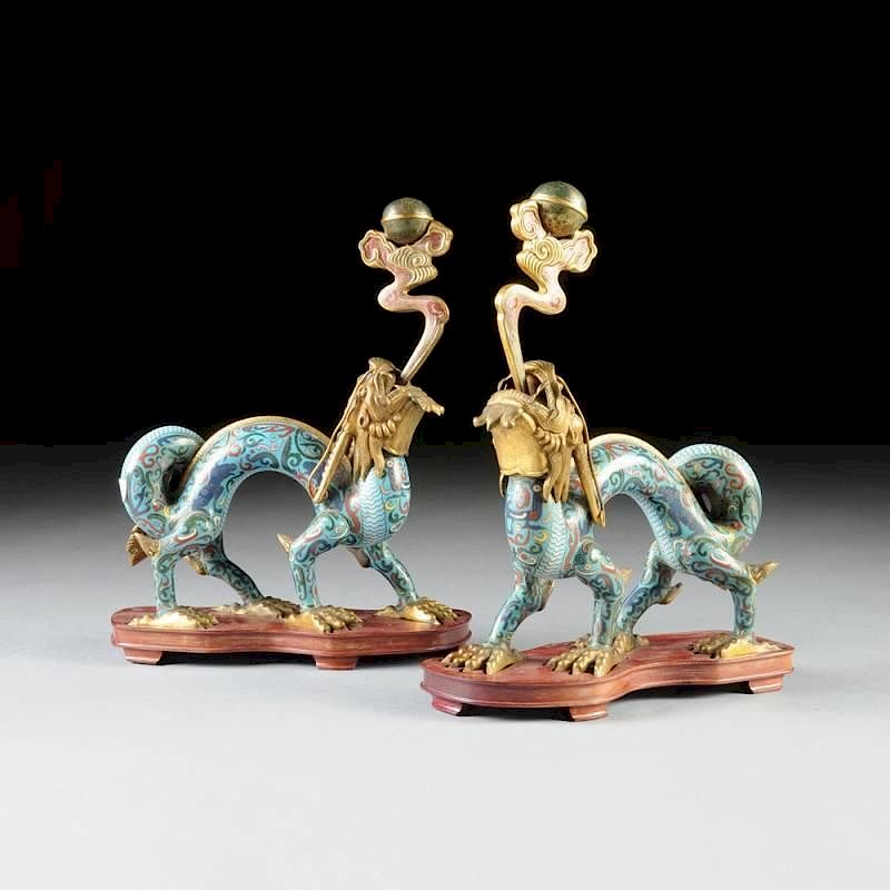 Appraisal: A PAIR OF CHINESE CLOISONN DRAGON FORM CANDLE STANDS QING