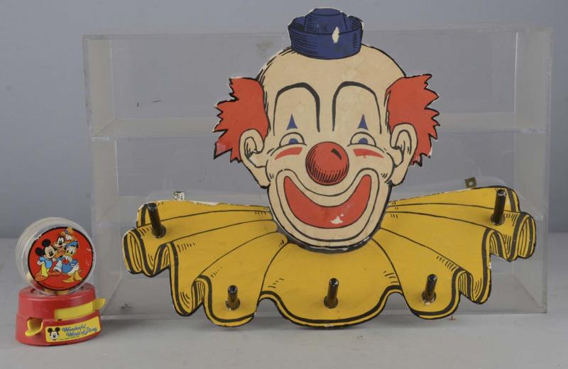 Appraisal: Lot of Disney Gum Dispenser Clown Coat Rack Two children's