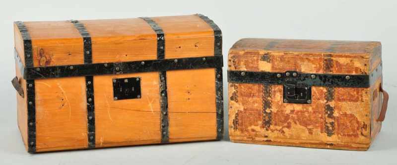 Appraisal: Lot of Antique Doll Trunks Description Natural wood finish with