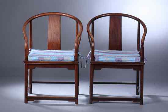 Appraisal: FOUR CHINESE ROSEWOOD HORSESHOE BACK ARM CHAIRS th century -