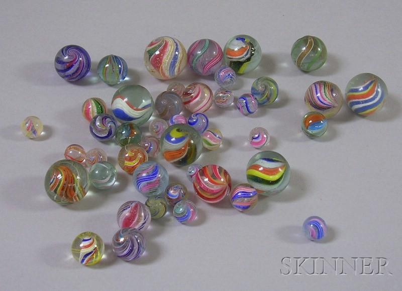 Appraisal: Forty-five Latticino Glass Marbles including solid core ribbon spiral with