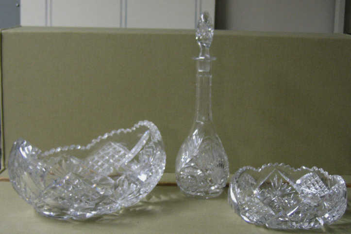 Appraisal: THREE CUT GLASS SERVING PIECES Star and diamond motifs comprising