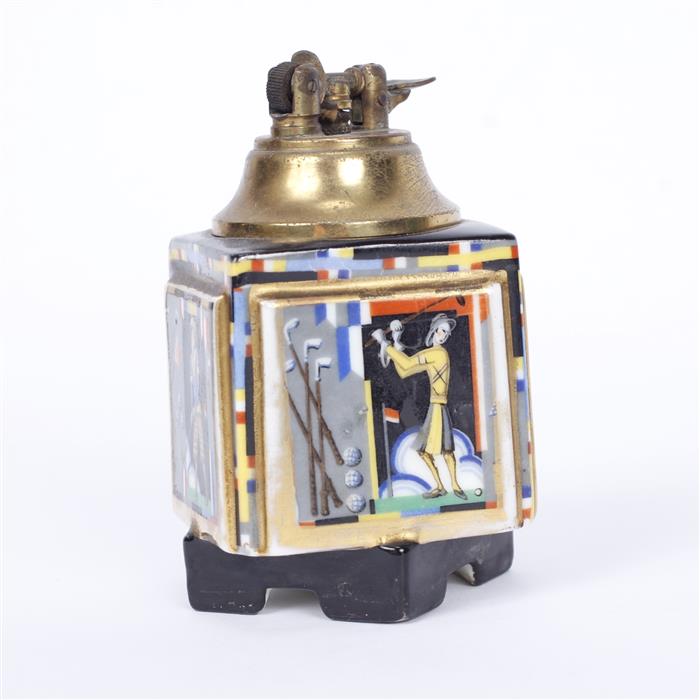 Appraisal: Czech Art Deco painted porcelain table lighter with stylized golfer