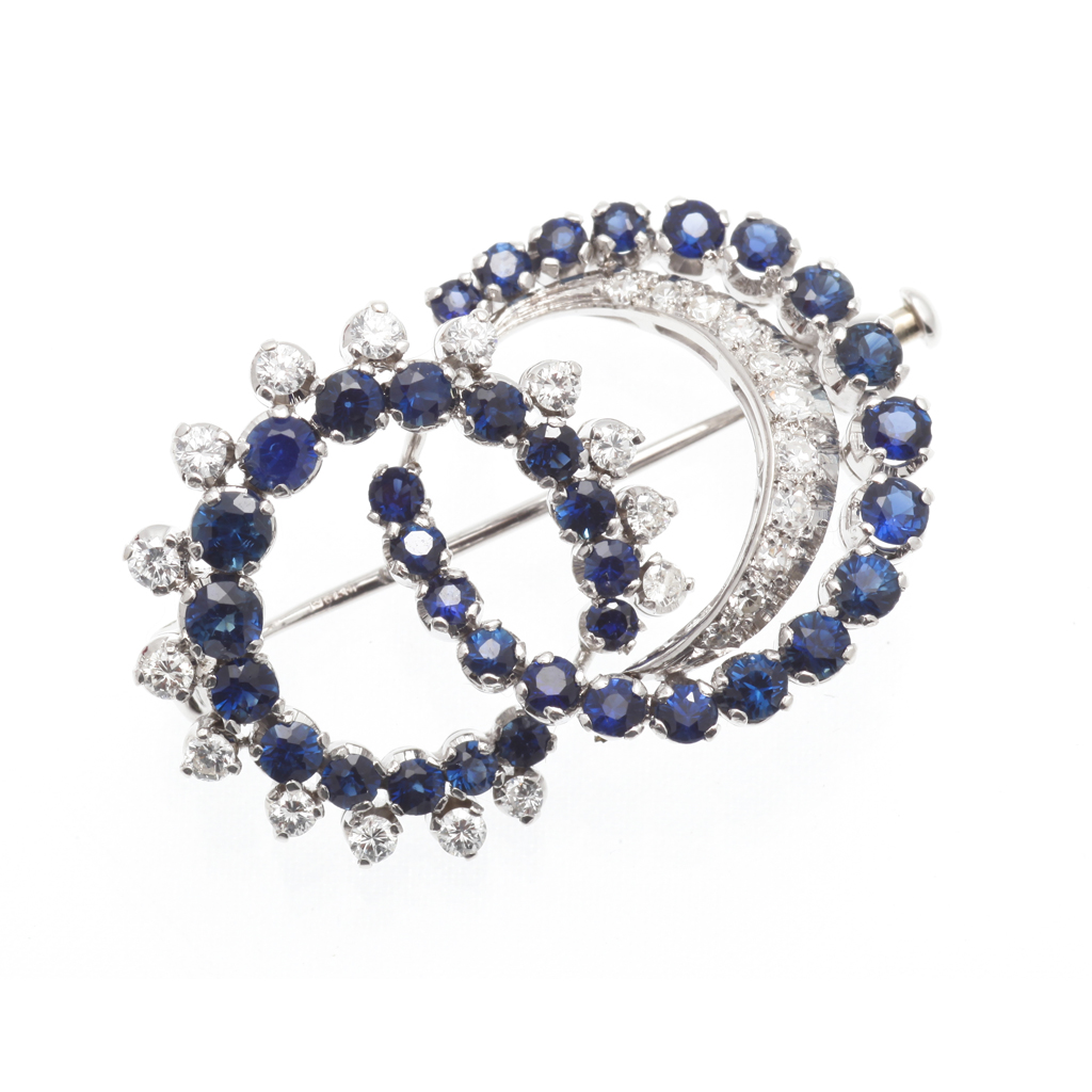 Appraisal: A sapphire and colourless gem set brooch composed of two