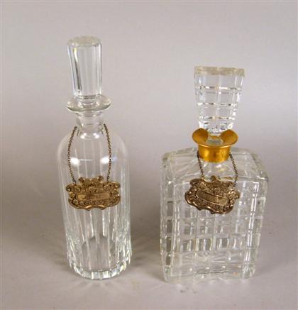 Appraisal: Two cut glass decanters One round decanter stamped Baccarat with