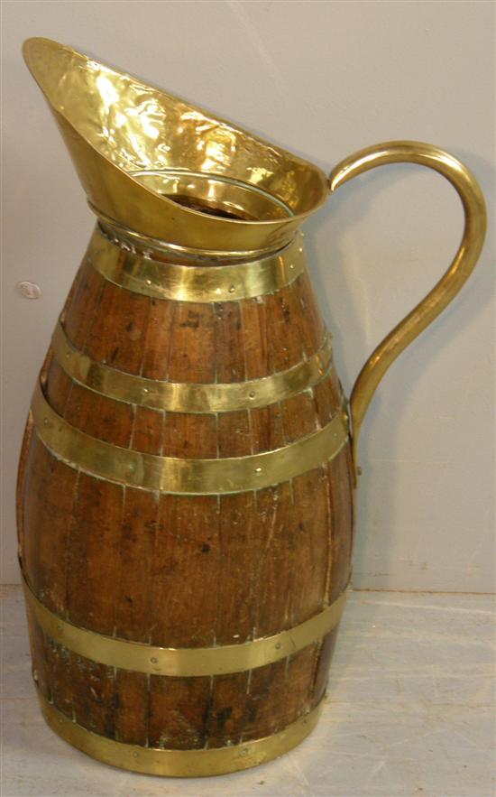 Appraisal: th century oak jug with brass banding and handle h