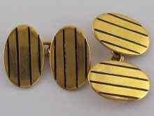 Appraisal: A pair of yellow metal tests carat gold cufflinks decorated