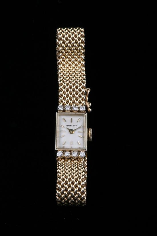 Appraisal: TIFFANY CO K YELLOW GOLD AND DIAMOND WATCH Rectangular case