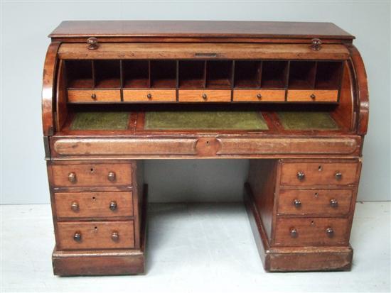 Appraisal: th century mahogany cylinder front bureau the interior with drawers