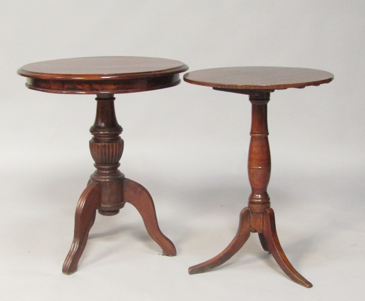 Appraisal: A Victorian oak tilt top occasional table raised on a