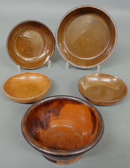 Appraisal: Four Pennsylvania redware pie plates th c largest dia and