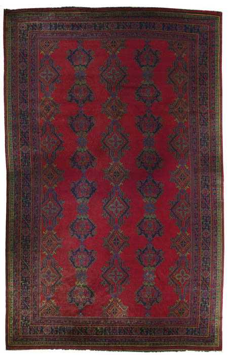 Appraisal: EUROPEAN SAVONNERIE ca Red background with five gul rows in