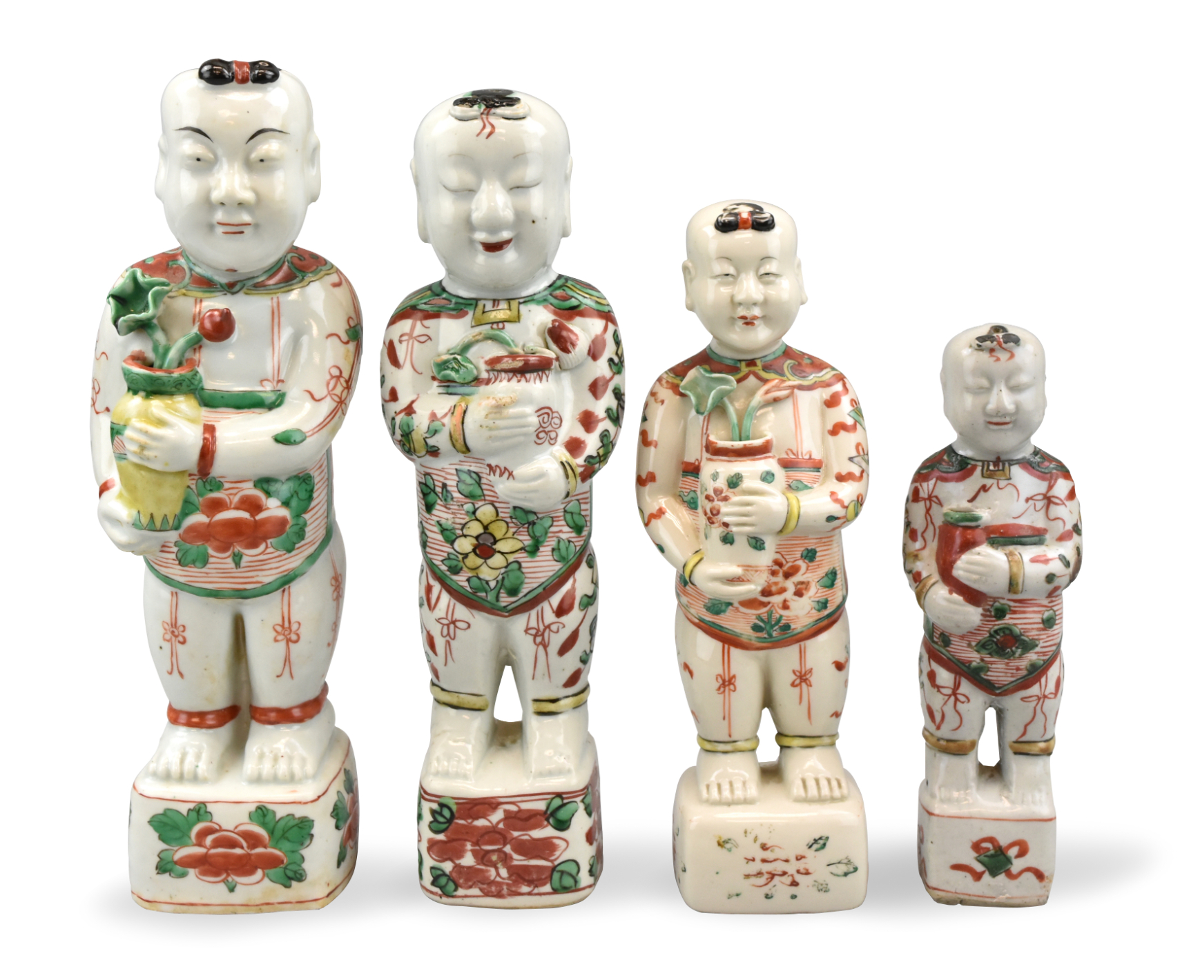 Appraisal: Four Chinese famille verte Boy figures th Century Kangxi -