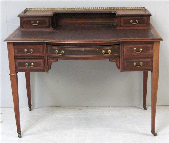 Appraisal: Edwardian mahogany bow fronted crossbanded and line inlaid writing desk