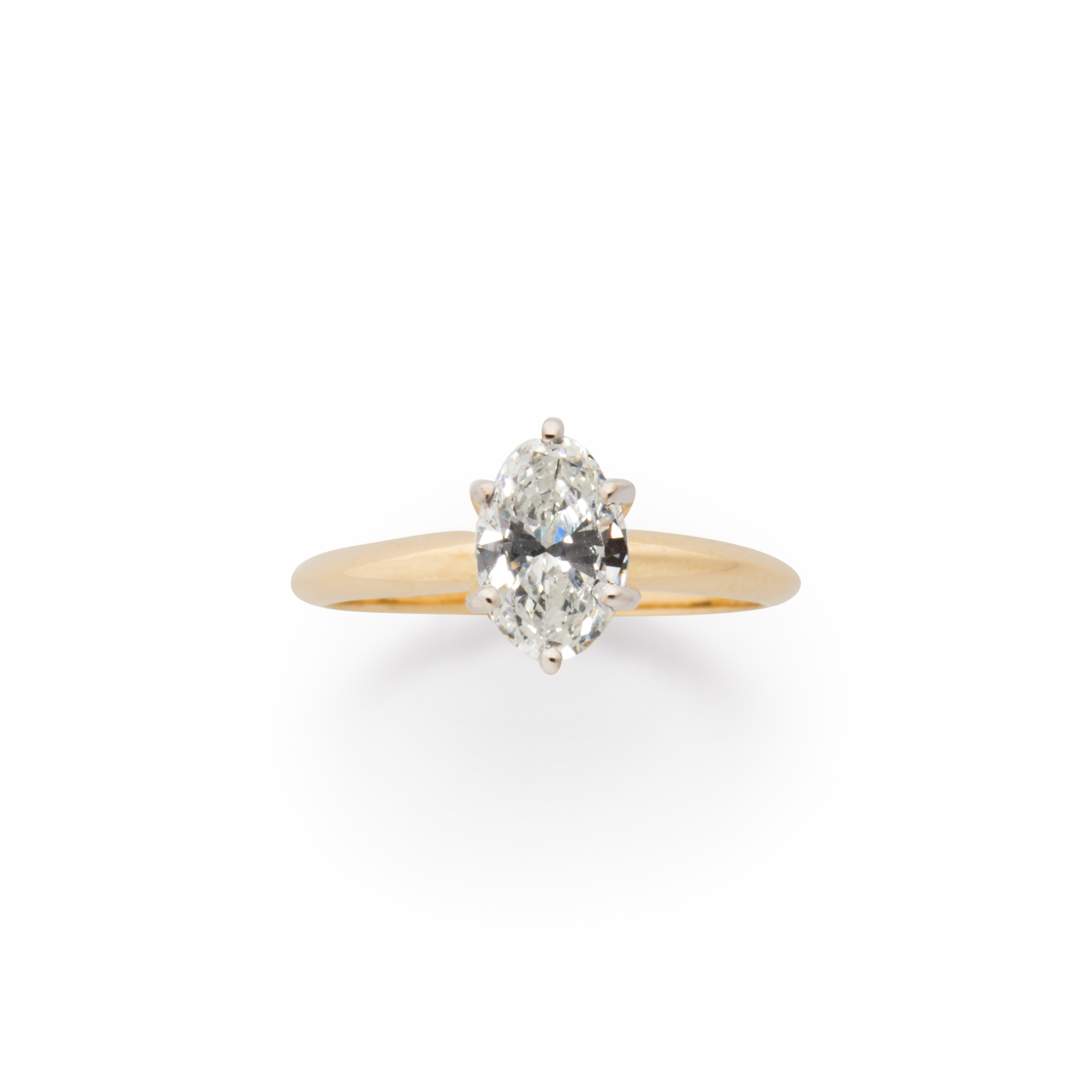 Appraisal: A DIAMOND AND FOURTEEN KARAT GOLD RING A diamond and