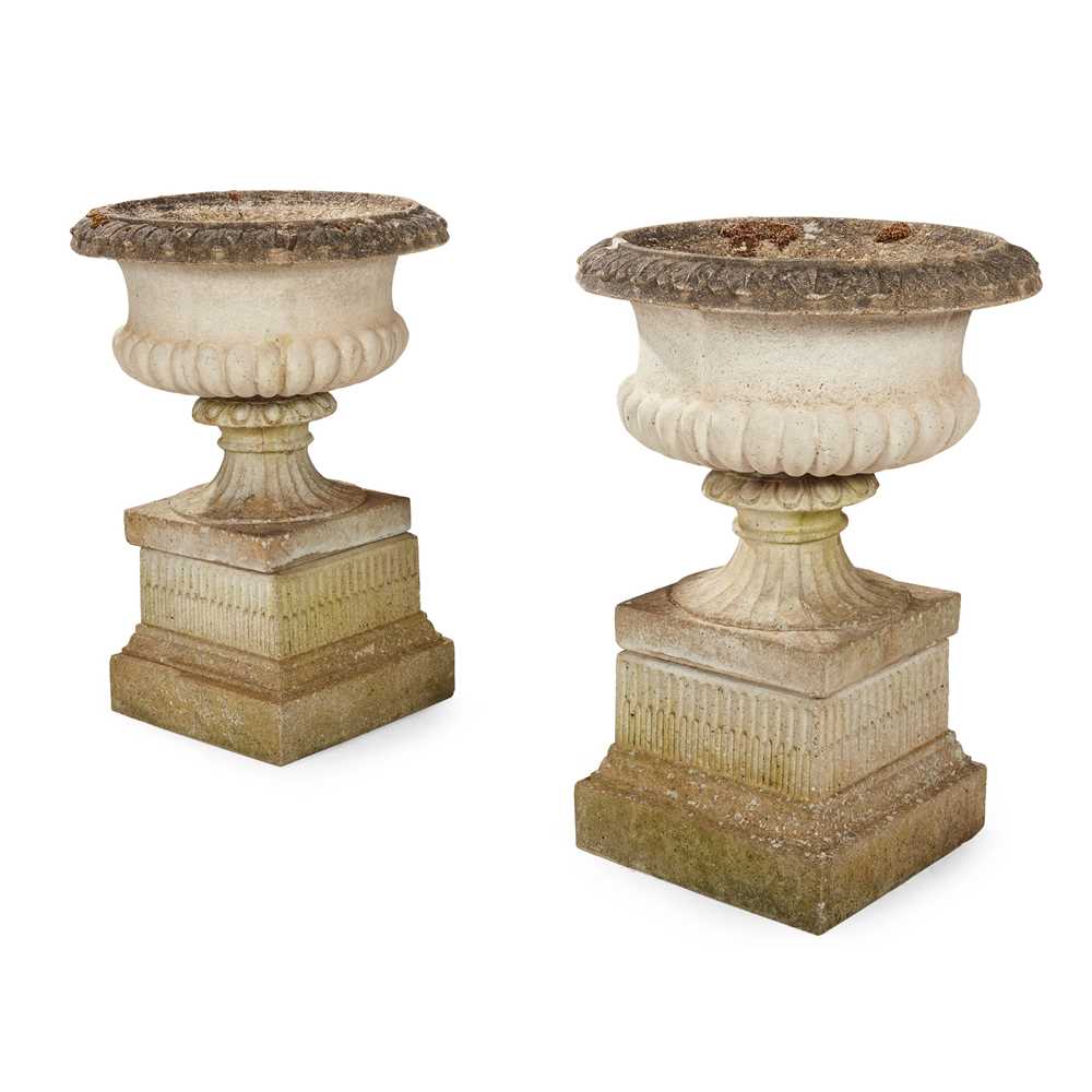 Appraisal: PAIR OF COMPOSITION STONE URNS AND PEDESTALS TH CENTURY of