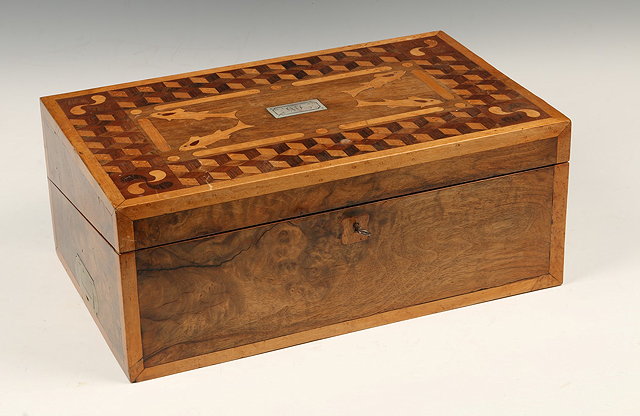 Appraisal: A VICTORIAN MARQUETRY INLAID BURR WALNUT WRITING BOX with fitted