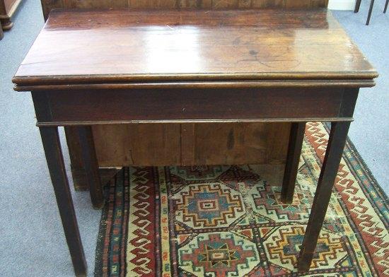 Appraisal: An early th Century mahogany tea table the folding top