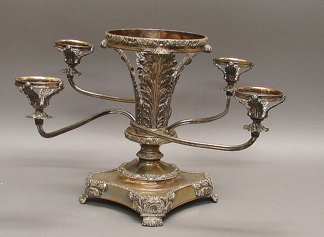 Appraisal: Center ring and rings with scrolled branches each with acanthus-leaf