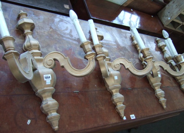 Appraisal: A set of four modern gilt painted wooden twin branch