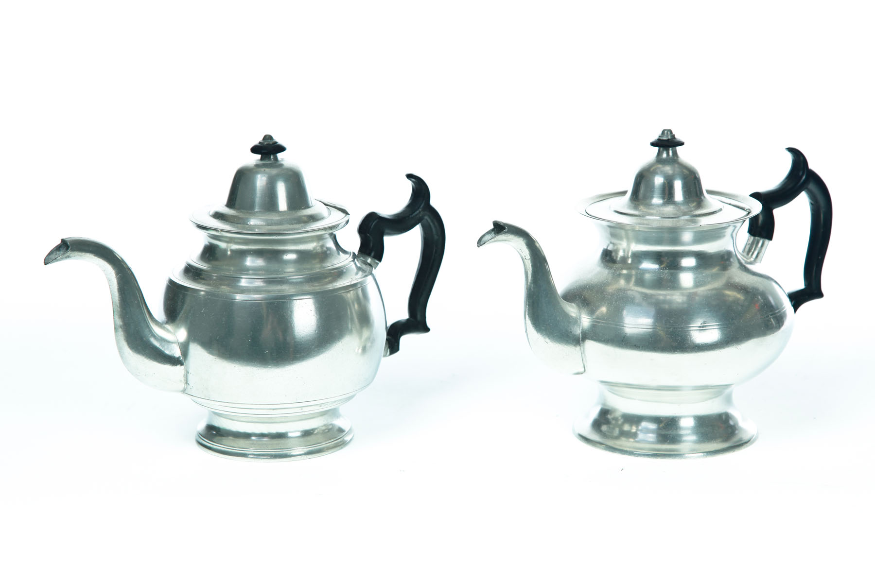 Appraisal: TWO PEWTER TEAPOTS Mid th century Touch marks for Boardman