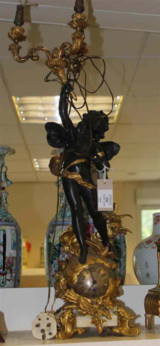 Appraisal: A Louis XV style gilt metal and spelter figural clock