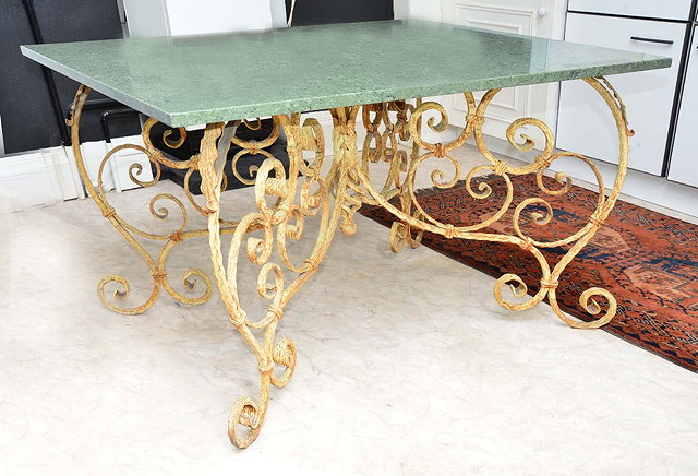 Appraisal: A SPANISH STYLE PAINTED WROUGHT IRON CENTRE TABLE with green