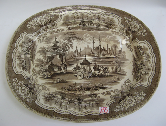 Appraisal: ENGLISH IRONSTONE BROWN TRANSFERWARE PLATTER C of an outdoors scene