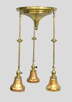 Appraisal: Art Crafts Style Lighting Fixture with Iridescent Glass Shades Polished