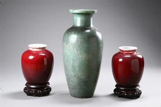 Appraisal: THREE VASES Asian th century ceramic Pair of porcelain vases