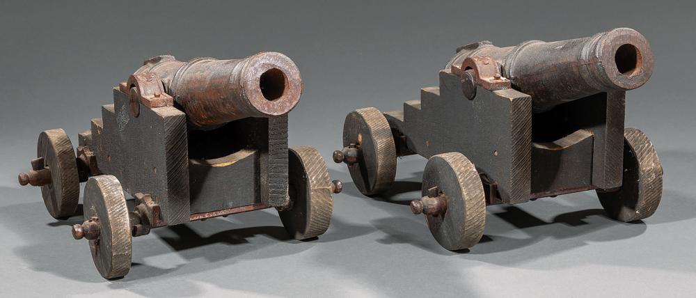 Appraisal: Pair of Decorative Cast Iron and Wood Cannons th c