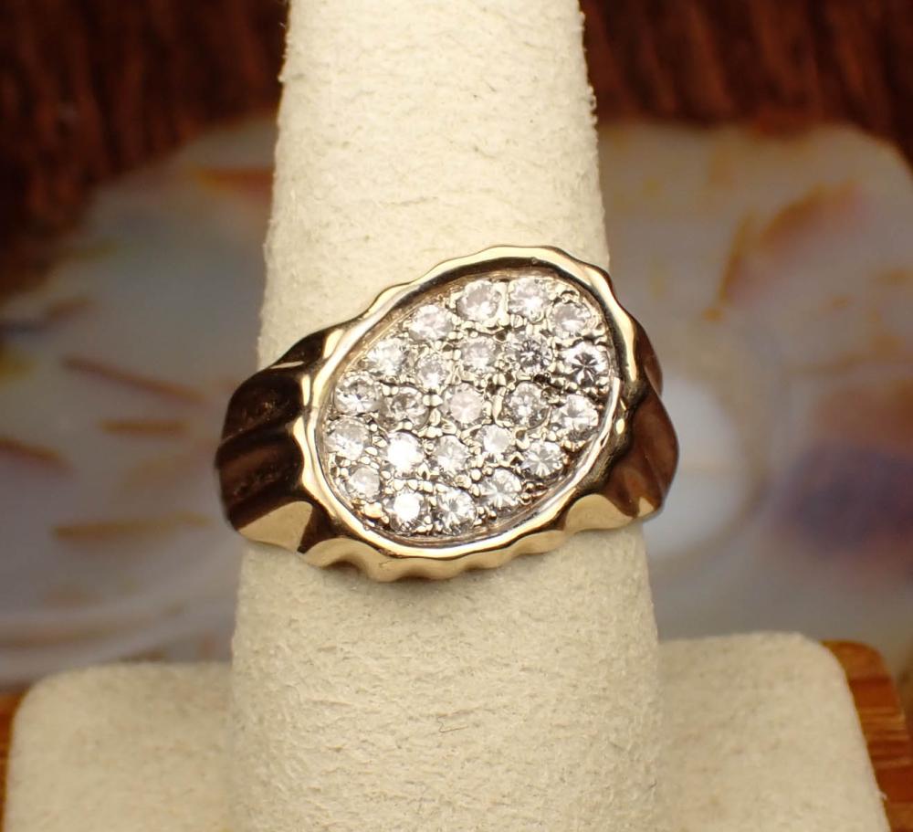 Appraisal: DIAMOND AND FOURTEEN KARAT GOLD RING with Reliant Gem Lab