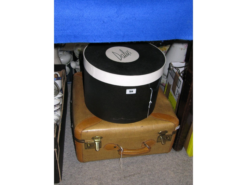 Appraisal: Lot comprising a suitcase with fur muff hat and feather