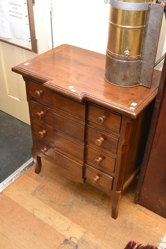 Appraisal: A FOUR DRAWER BREAKFRONT TIMBER CHEST FOUR DRAWER BREAKFRONT TIMBER