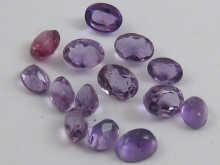 Appraisal: A quantity of loose polished amethysts approx carats