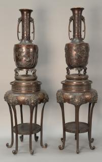 Appraisal: Pair of large Japanese bronze vases having relief panels of