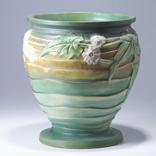 Appraisal: ROSEVILLE Green Luffa sand jar Restoration to base and area