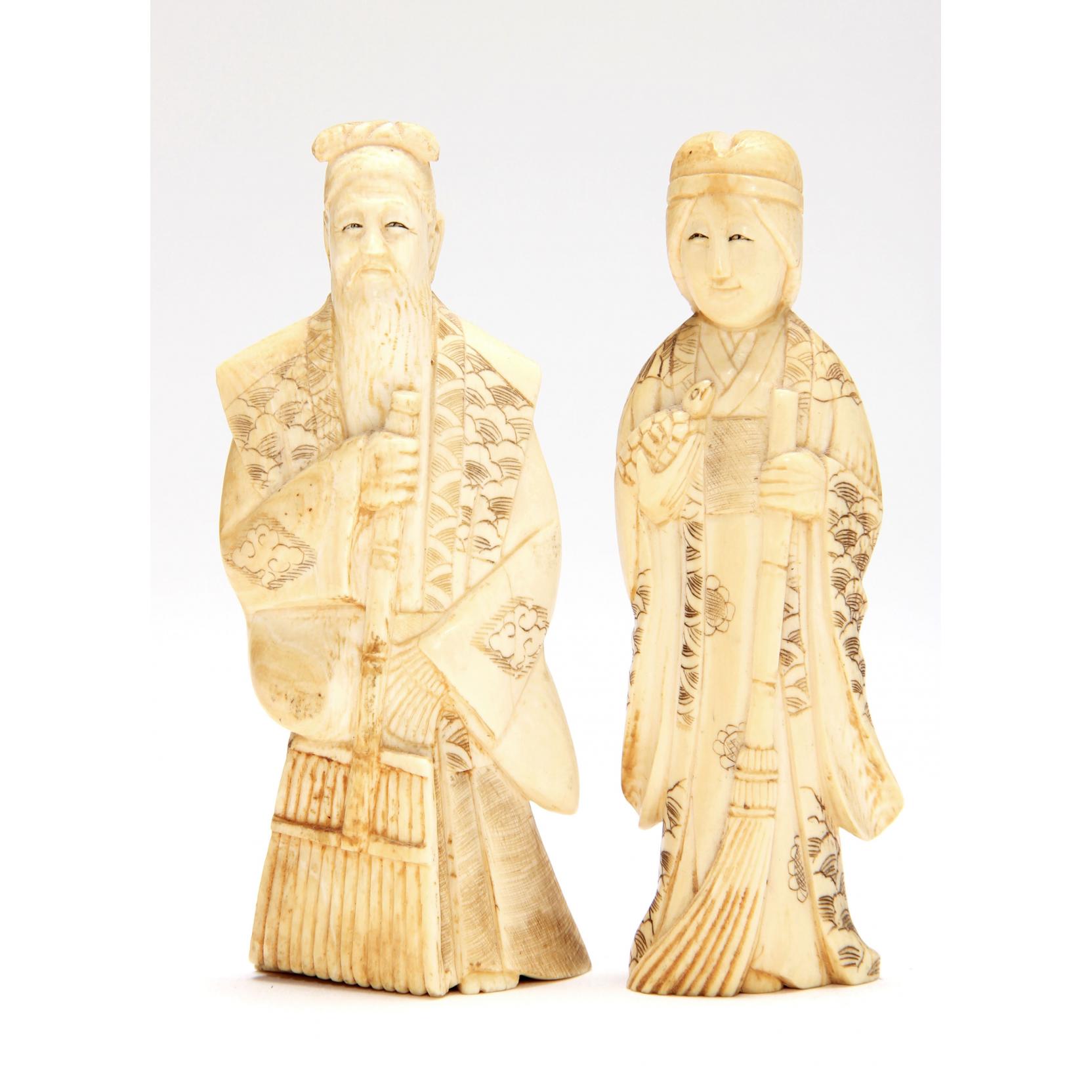 Appraisal: Smiling Japanese Ivory Couple both signed on the underside and