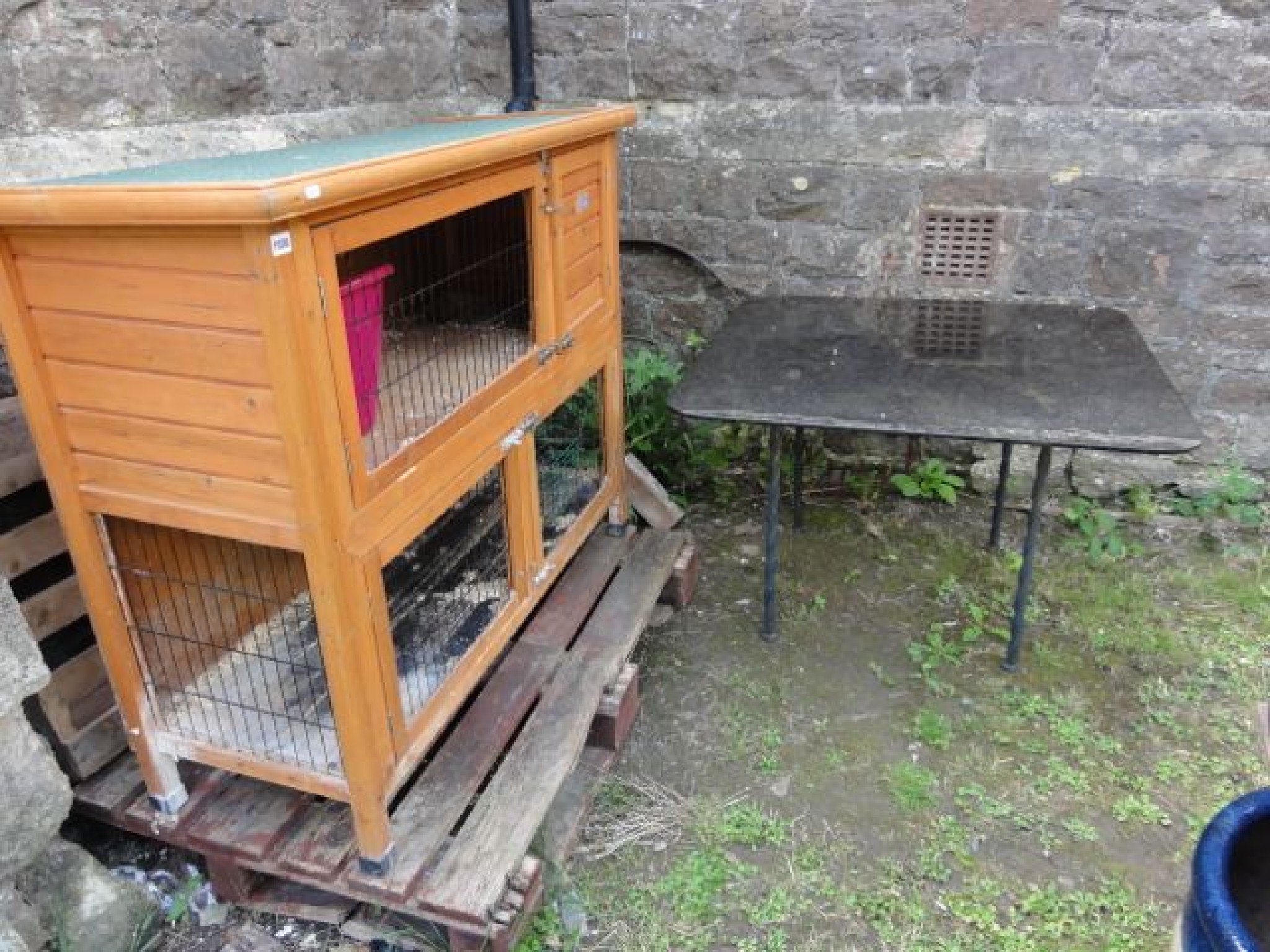 Appraisal: A contemporary two tier freestanding rabbit hutch with plaque Bunny