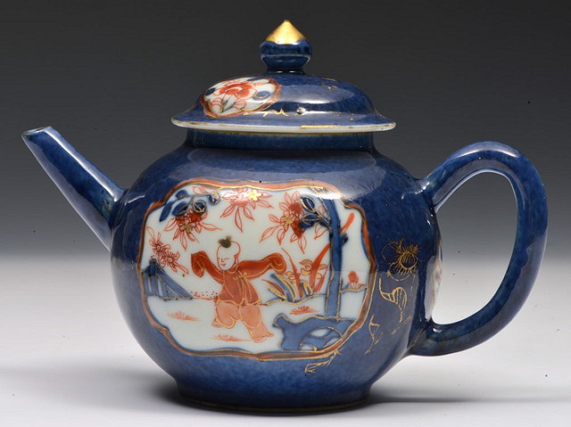 Appraisal: A CHINESE COBALT BLUE OVOID TEAPOT having two reserve panels